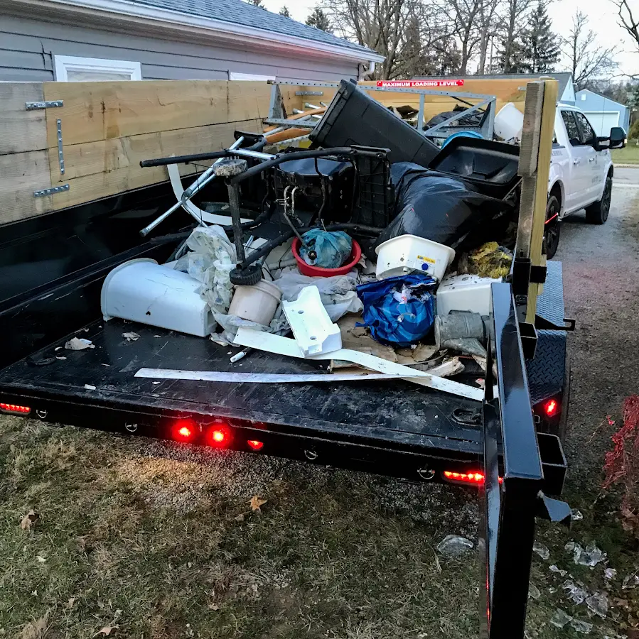 Roll-off dumpster delivered to a residential driveway in Peninsula